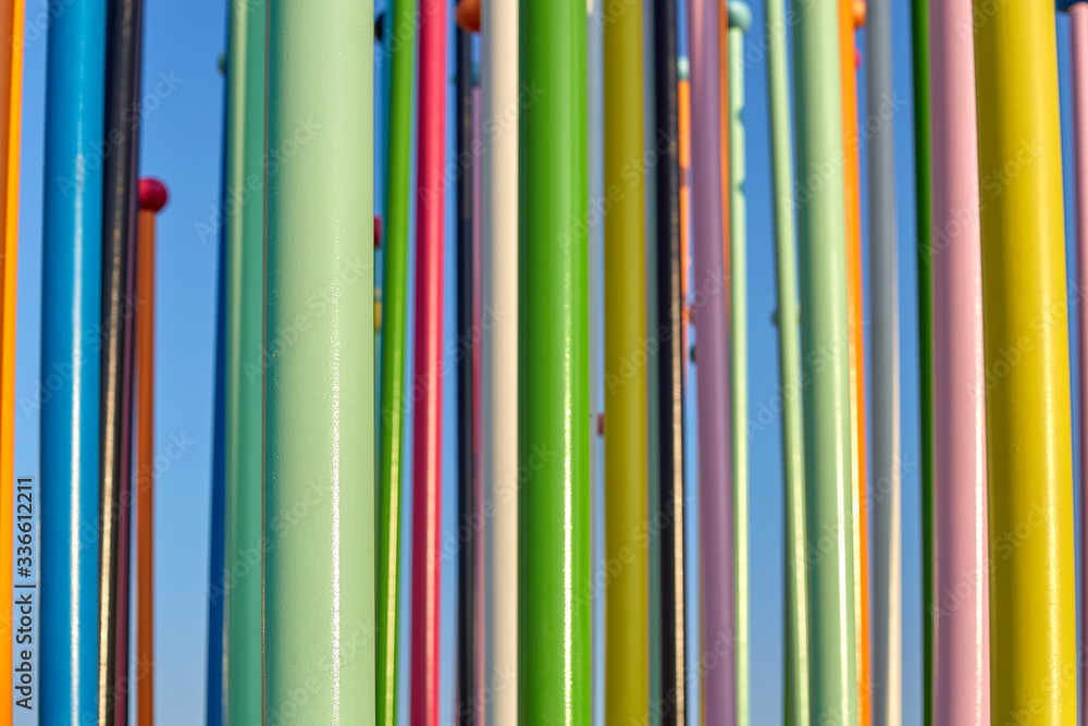 Background from many multicolored vertical pillars. The concept of positive. Background from many multicolored vertical pillars. The concept of positive.