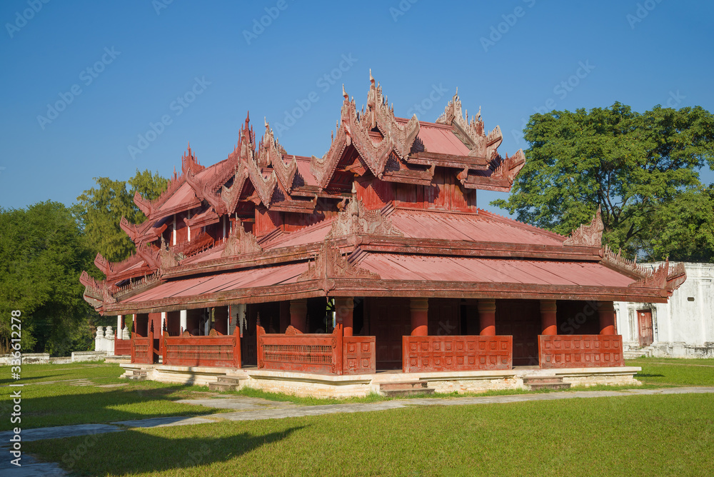 Wooden palace pavilion close-up on a Sunny day. Mandalay, Myanmar (Burma)