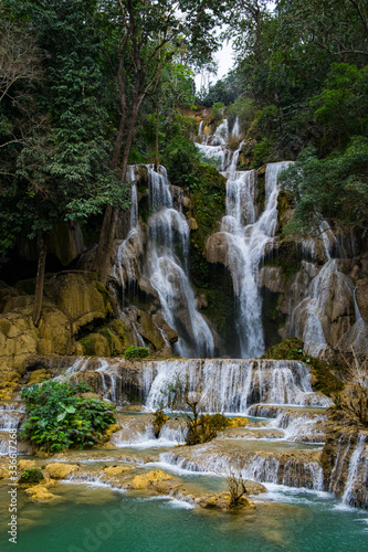 Fototapeta Naklejka Na Ścianę i Meble -  Kuang Si Waterfalls clear waters in area Luang prabang, Laos