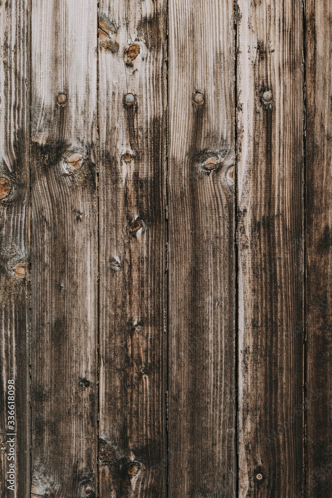 Naklejka premium Old wooden grunge texture or background photographed on natural light.