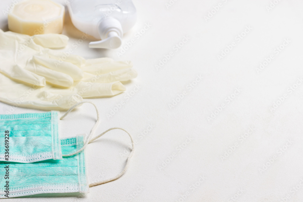 Protective medical mask, latex gloves on white background. Protective medical mask, latex gloves on white background.
