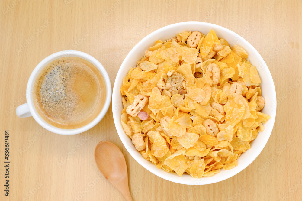 cereal in a white bowl on wooden background. Healthy breakfast concept. cereal in a white bowl on wooden background. Healthy breakfast concept.