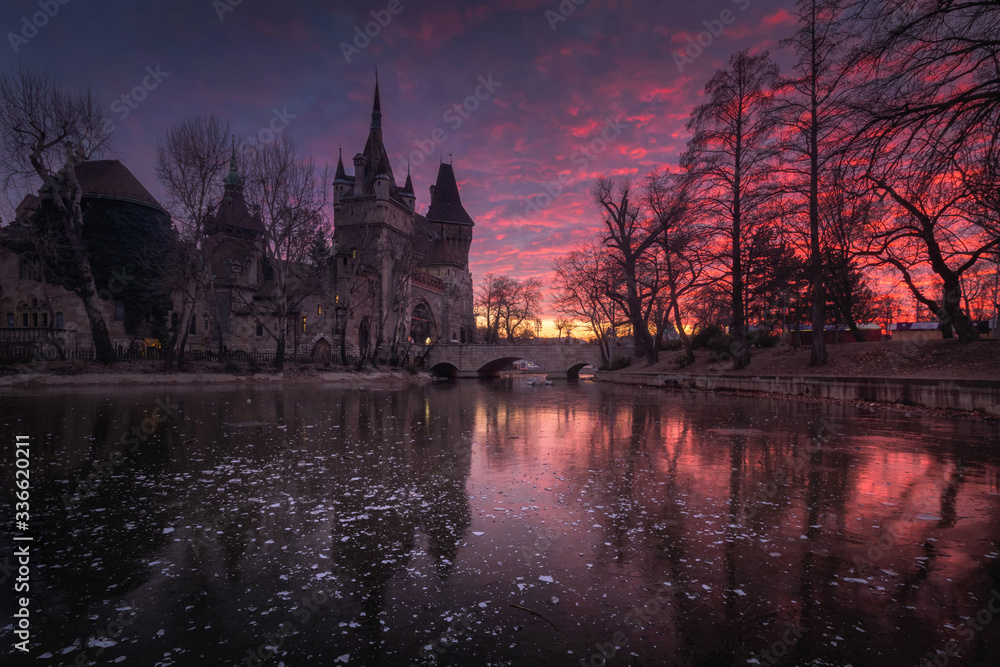 Sunset over Vajdahunyad Castle in the City Park of Budapest, Hungary
