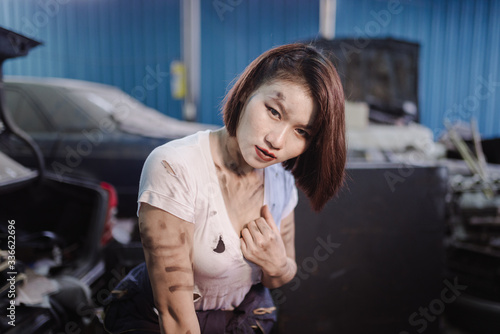 mechanic girl in the garage