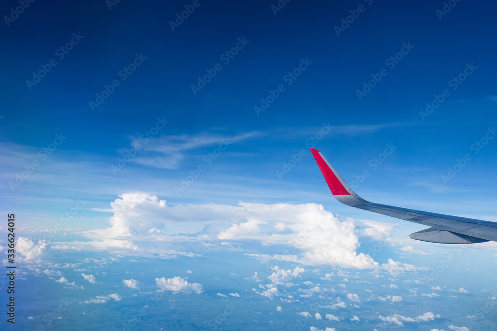 Fototapeta premium red winglet in graduated dark blue sky