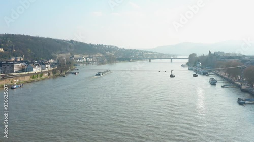 Cable car Seilbahn lift to the fortress ehrenbreitstein over the river rhine with a ship in Koblenz near Deusches Eck german corner drone aerial shot 4k 30p photo