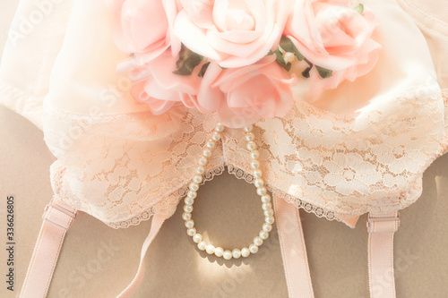 peach and pink lace lingerie and wedding bouquet
