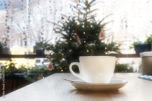 closeup of a cup of coffee at coffee shop