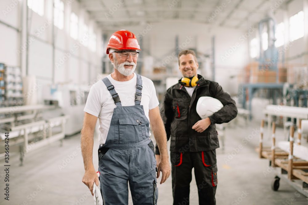 Colleagues working together. Workers in factory. Colleagues working together. Workers in factory.