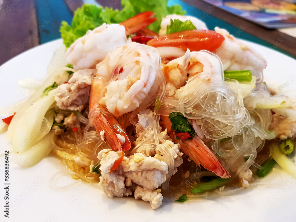 Shrimp vermicelli salad with chopped chicken Salad in white plate Shrimp vermicelli salad with chopped chicken Salad in white plate