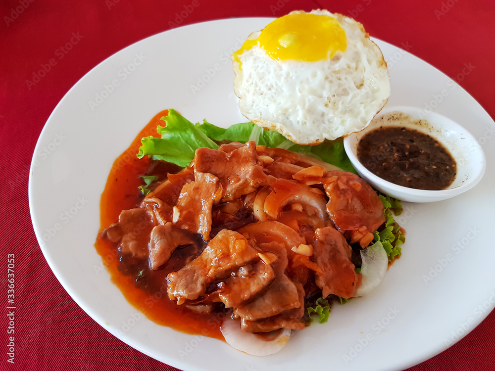 Cambodian food is called Lok Lak, an ingredient of Beef, Tomato, Lettuce, pepper sauce, served with steamed rice and fried egg