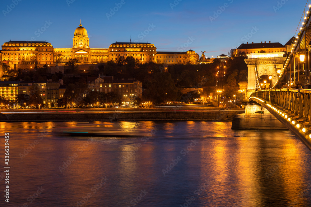 Royal Palace and Chain bridge over Danube river twilight view in Budapest city, Hungary