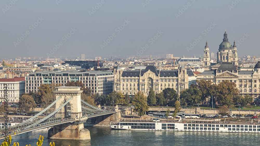 View of famous Chain bridge and St Stephen Basilica from the Royal Palace in Budapest, Hungary View of famous Chain bridge and St Stephen Basilica from the Royal Palace in Budapest, Hungary