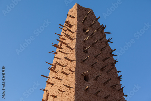 Agadez town African mud mosque minaret  photo