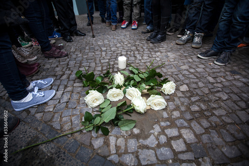low angle shot of kid's during a Stolpersteine (stumbling stone) ceremony. 