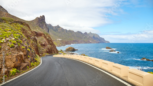 Scenic ocean drive by cliffs of the Macizo de Anaga mountain range, Tenerife, Spain.