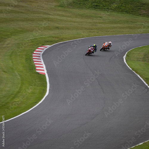 A shot of two racing bikes speeding round corners © SnapstitchPhoto