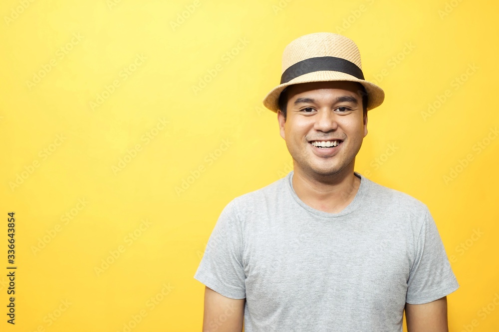 Handsome men in a good mood, bright yellow background room Handsome men in a good mood, bright yellow background room