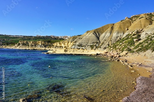 Xatt L-Ahmar - stony seaside with characteristic sandstone cliffs and crystal blue water. Ideal place for picnic or sunbathing, diving, snorkelling and swimming far away from crowdy beaches.