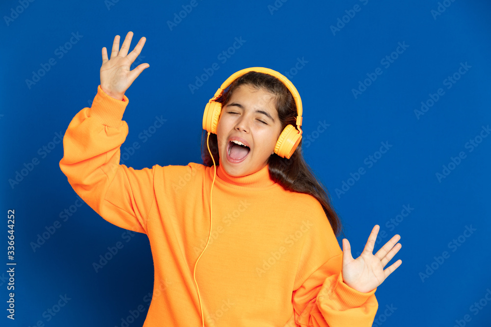 Preteen girl with yellow jersey Preteen girl with yellow jersey