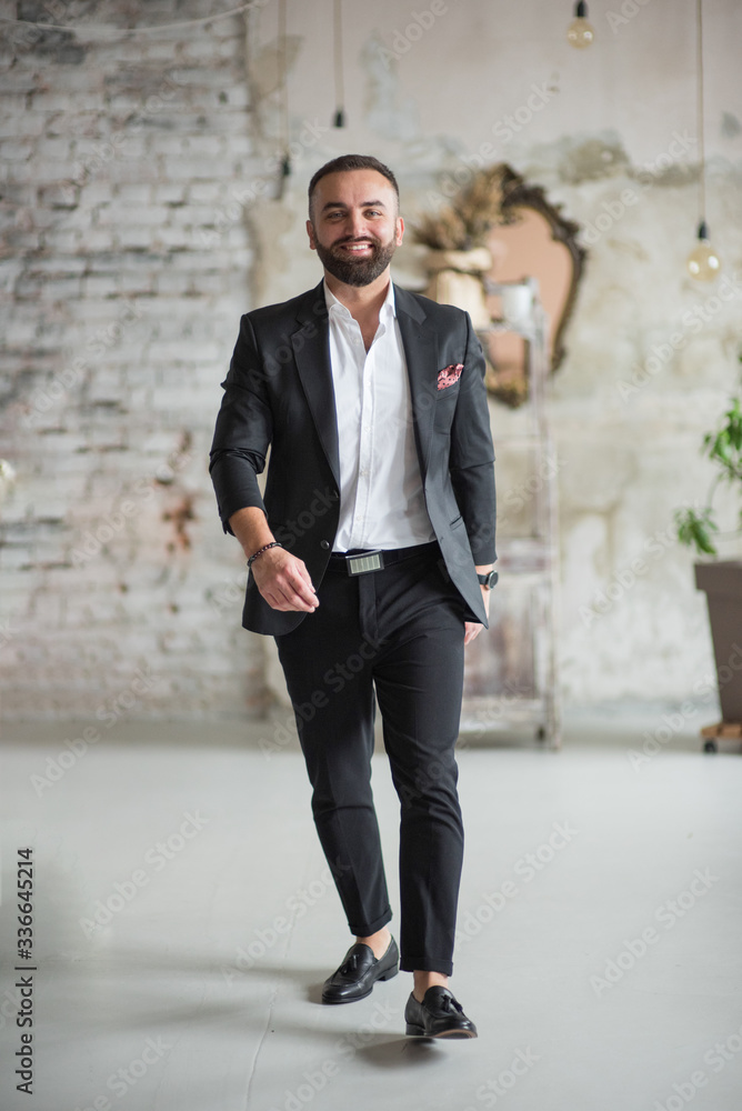 man walk inside home in black suit, smiling man walk inside home in black suit, smiling