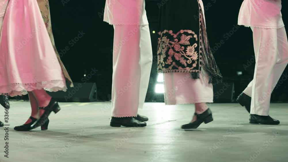 Traditional romanian folklore dancers in traditional costumes dancing ...