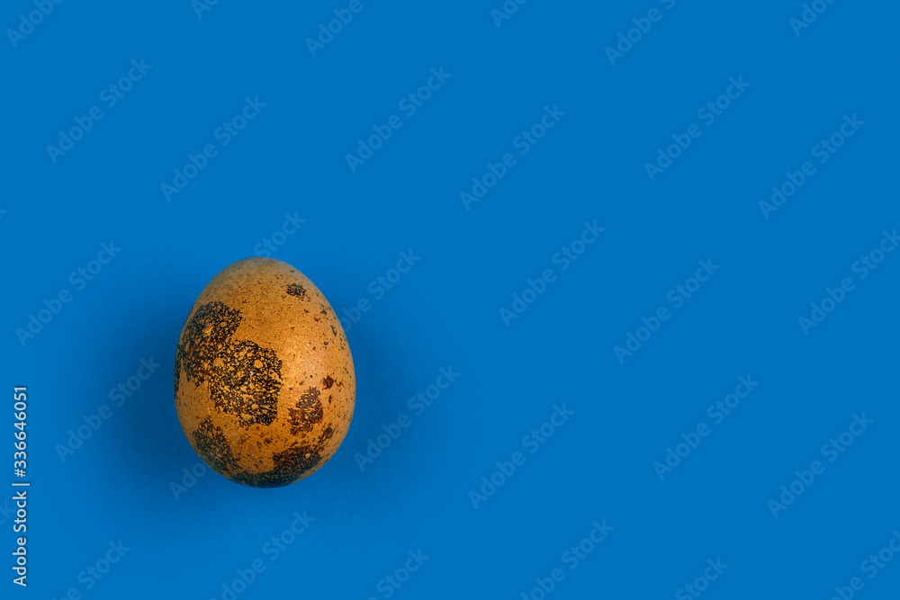 Easter egg painted orange with gold. Easter egg painted orange with gold.