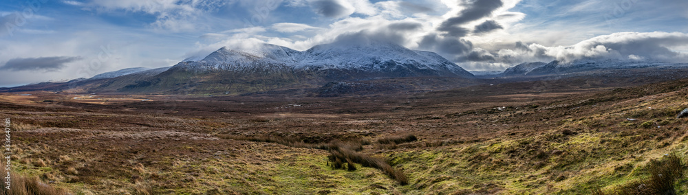 In the middle of scottish highlands with mountains panorama In the middle of scottish highlands with mountains panorama