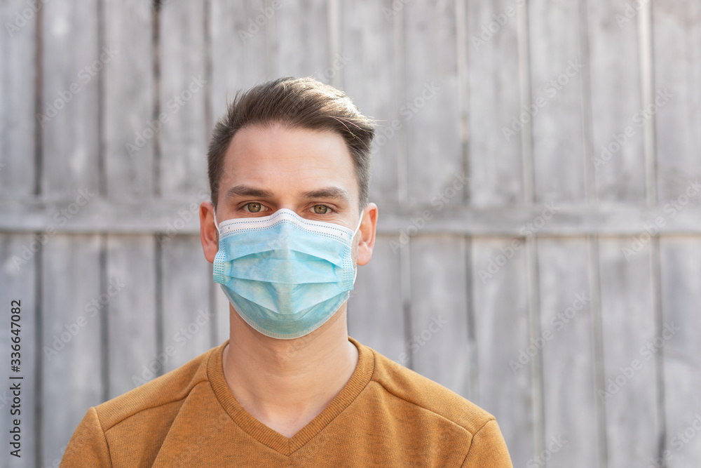 Young man with surgical mask