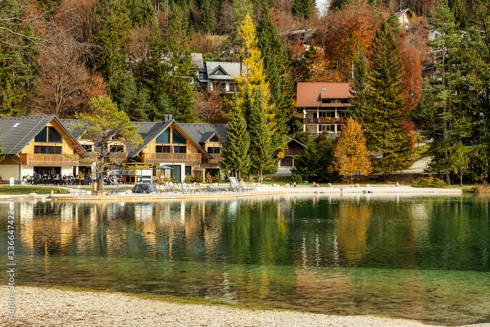 Lake Jasna with emerald clear water in autumn season, splendid view in Slovenian Alps.