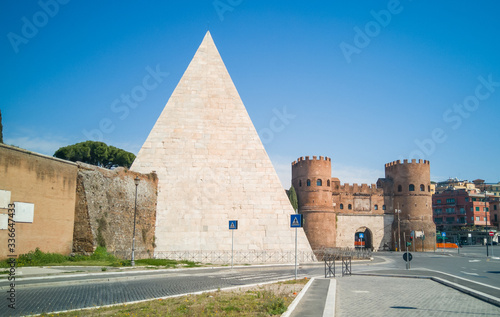 ollowing the coronavirus outbreak, the italian Government has decided for a massive curfew, leaving even the Old Town, usually crowded, completely deserted. Here in particular Porta San Paolo photo