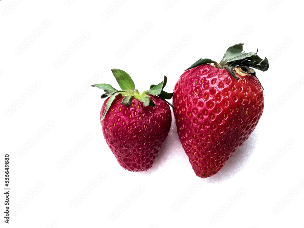 garden berries on a white background. perfect background for slides. an advertising option for farmers. the farm's products. red strawberries. strawberries in sugar garden berries on a white background. perfect background for slides. an advertising option for farmers. the farm's products. red strawberries. strawberries in sugar