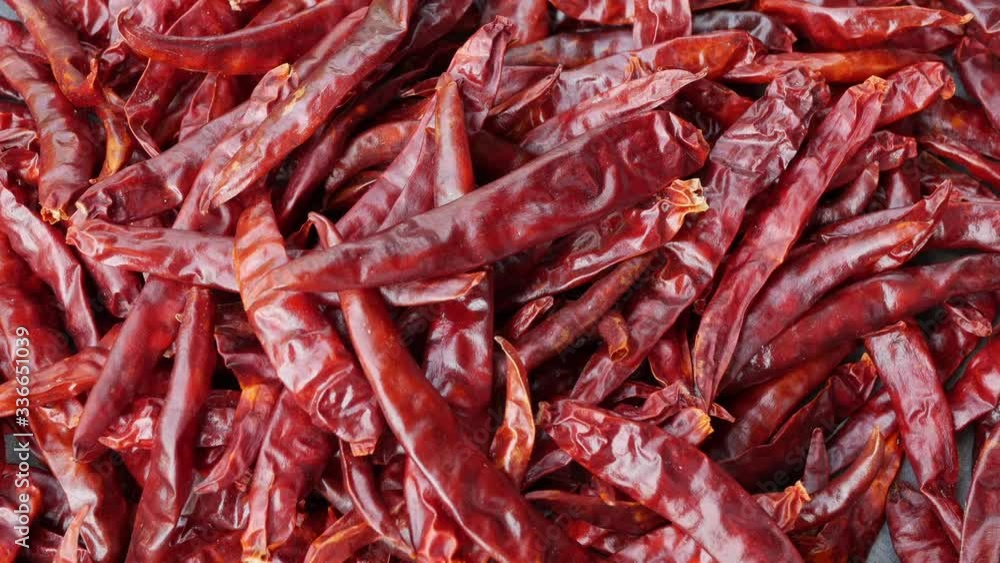 Dried red chili peppers. Shot of camera zoom in. Top view. Dried red chili peppers. Shot of camera zoom in. Top view.
