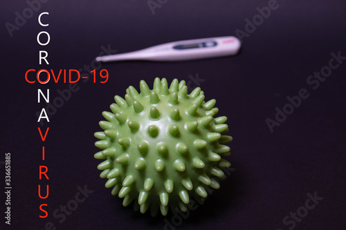 Pandemic. Coronavirus and thermometer for measuring temperature