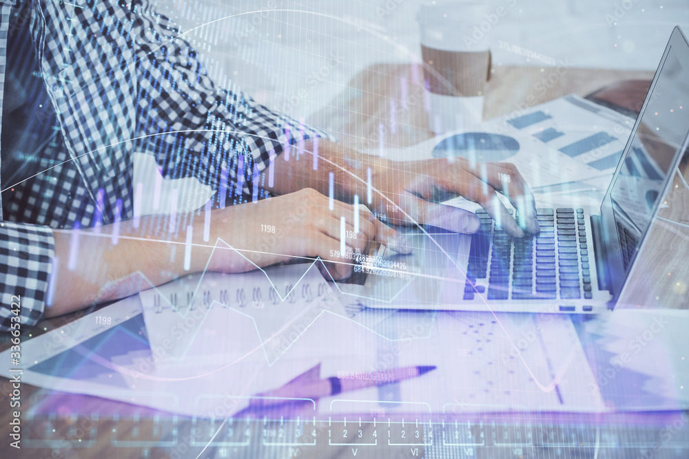 Multi exposure of stock market chart with man working on computer on background. Concept of financial analysis. Multi exposure of stock market chart with man working on computer on background. Concept of financial analysis.