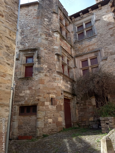 streets and walls of a medieval castle in the South of France in spring