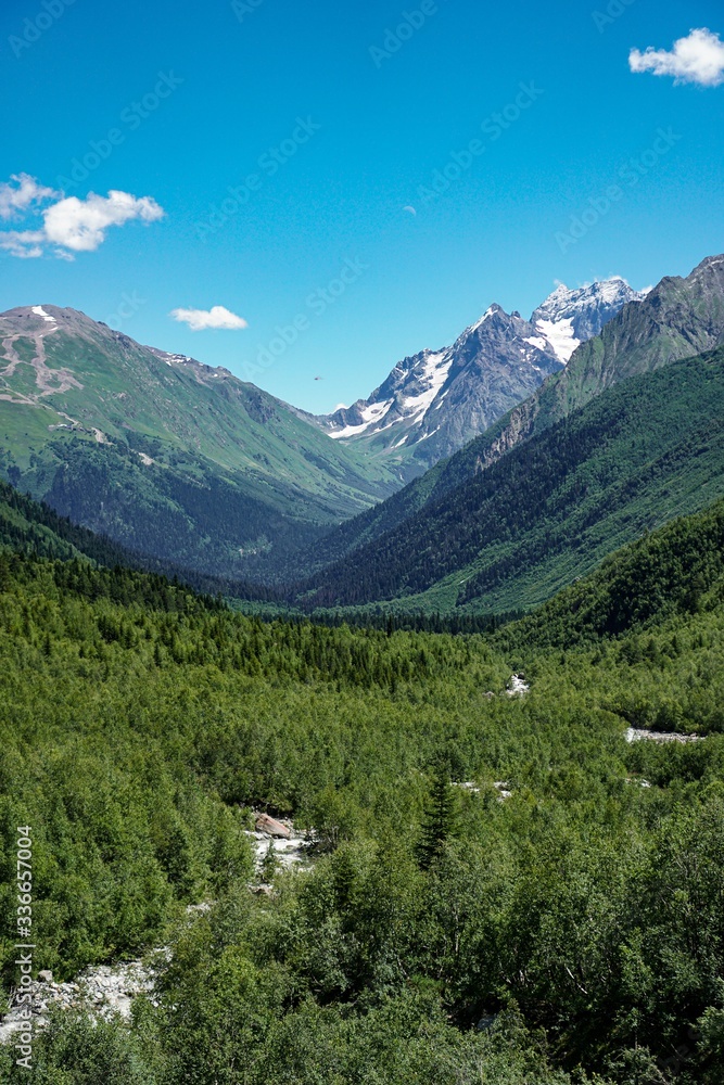 View of Dombay from Alibek waterfall in summer