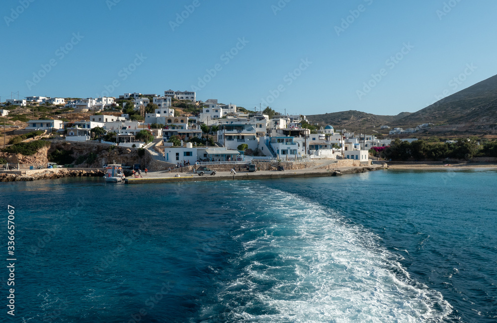 Ferry leaving the harbor on the island of Donousa in the Aegean Sea, Greece.