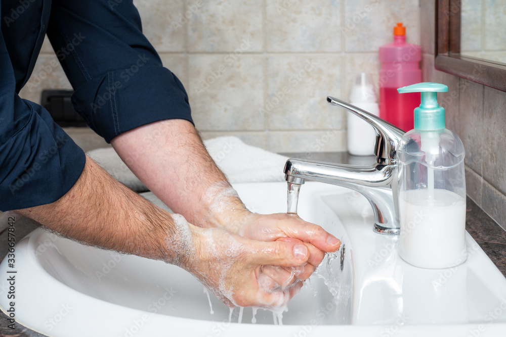 Coronavirus prevention. Hand washing with warm soapy water to prevent Covid-19 infection. Hand hygiene. Health. Coronavirus prevention. Hand washing with warm soapy water to prevent Covid-19 infection. Hand hygiene. Health.