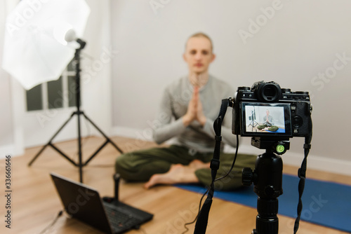 Online yoga practice, webinar e-learning, teacher working at home
