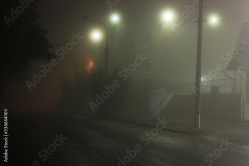 Fog in the city at night under the lights | EKATERINBURG, RUSSIA - 18 JULY 2013.