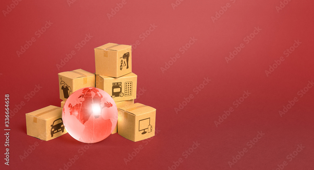 Fototapeta premium Red glass globe and cardboard boxes. Delivery of goods, shipping. Global economy, import export freight traffic. Globalization markets. Economics development. International world trade distribution