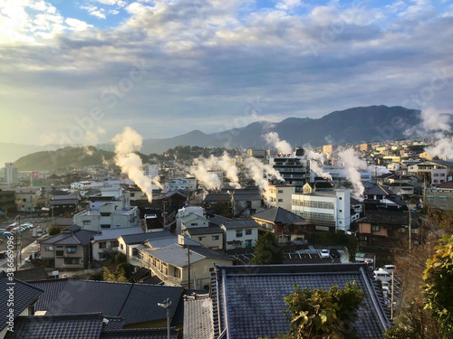 Beppu hot springs with rising steam in Oita
