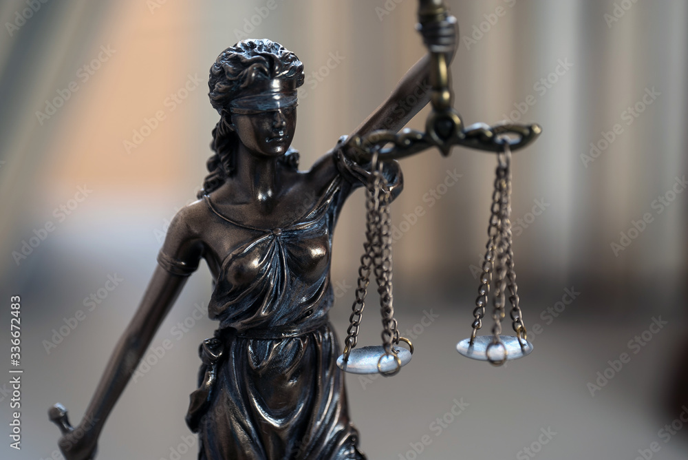 justice legal and jurisprudence concept. Law books on lawyer desk at law firm. justice legal and jurisprudence concept. Law books on lawyer desk at law firm.