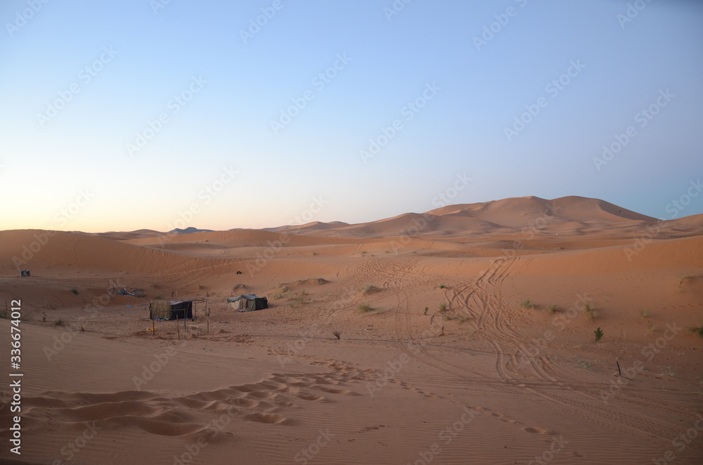 The traditional berbers tent in Merzouga. It is a small Moroccan town in the Sahara Desert, near the Algerian border. The traditional berbers tent in Merzouga. It is a small Moroccan town in the Sahara Desert, near the Algerian border.