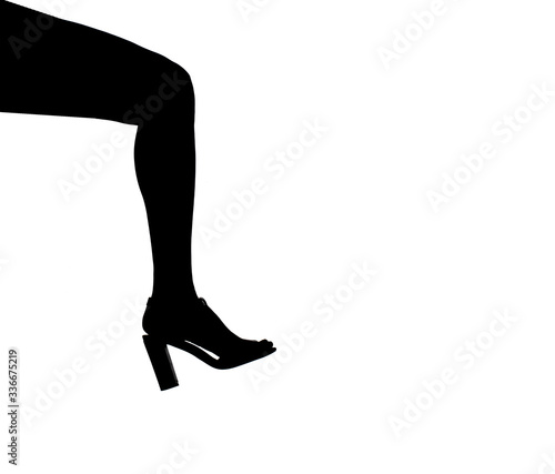 Leg of a beautiful girl with a shoe, silhouette contour isolated.