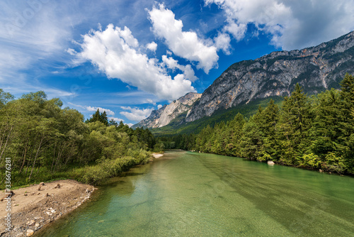 The green Gail River and Alps, the largest tributary of the Drava River. Carinthia, Austria, Europa