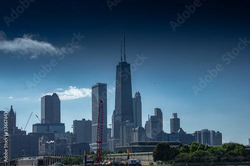 Chicago in summer with clear skies with buildings and greenery © Erol