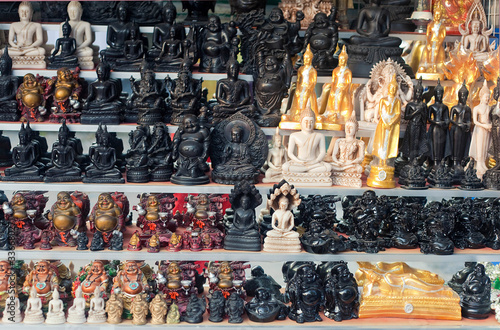 buddha statues on a street market in Asia