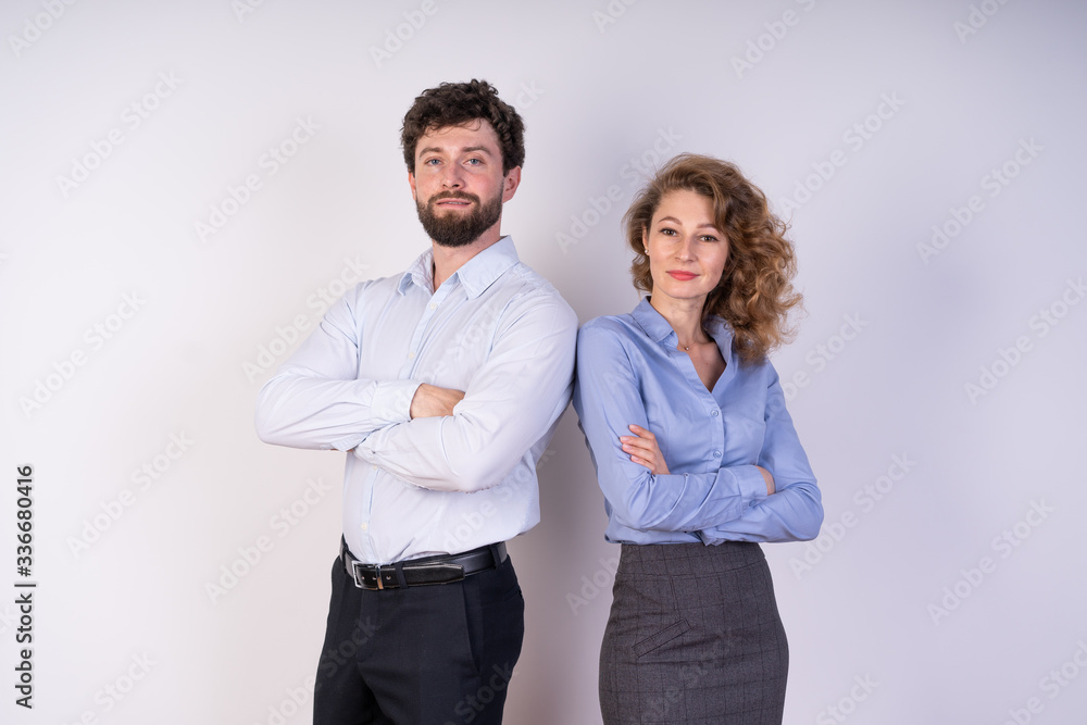 A bearded guy, a curly-haired girl, on white background, smiling, confident A bearded guy, a curly-haired girl, on white background, smiling, confident
